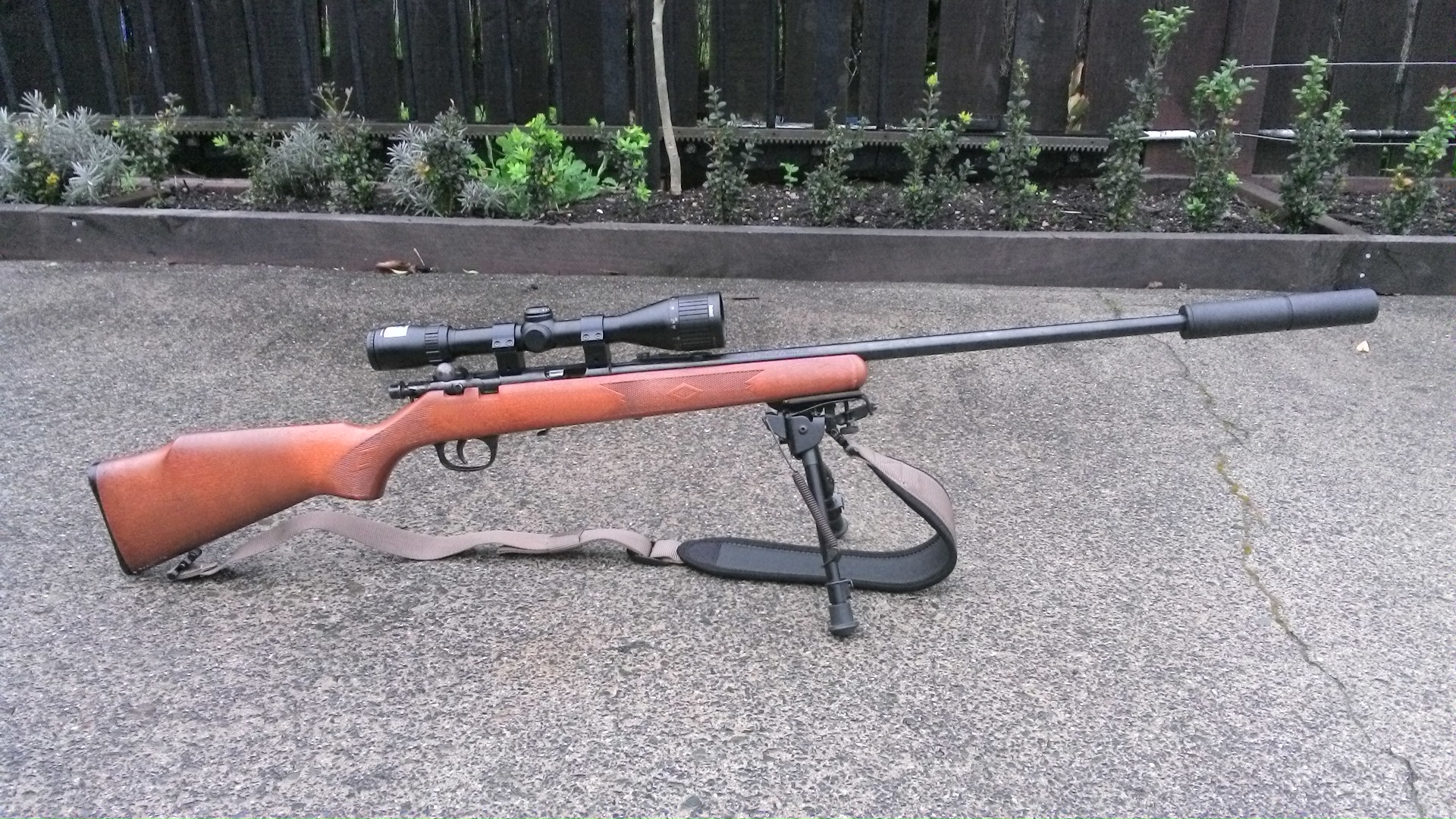 Name:  Marlin 882M .22WMR Bolt Action Blued Wood 4-12x40 AO Bushnell Elite 3200 MAE 22WMSTB Suppressor .JPG
Views: 3148
Size:  768.5 KB