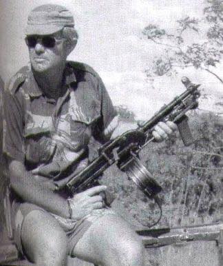Name:  John Fletcher of the Selous Scouts with one of armourer Phil Morgan's famous chopped RPDs.jpg
Views: 337
Size:  23.2 KB