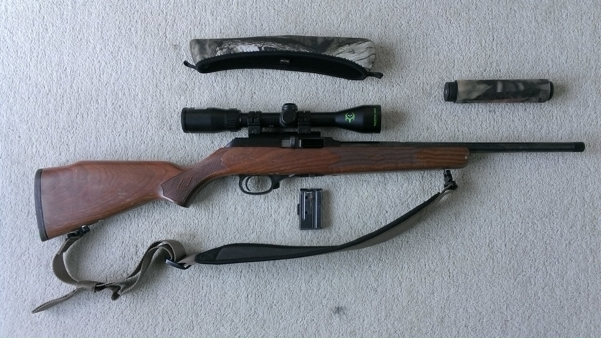 Name:  Marlin 922M .22WMR Semi-Auto Blued Wood Bushnell Elite 3200  3-9x40 DOA250 MAE Suppressor.JPG
Views: 1956
Size:  745.5 KB