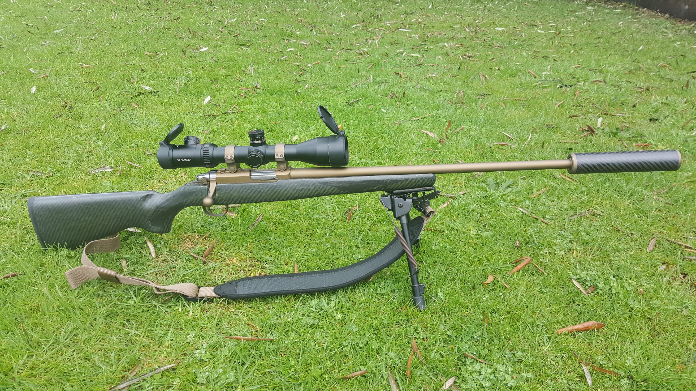 Name:  Ruger 77-22 .22 WMR Cerakoted SS Stug Carbon Stock 2.5-10x44 Vortex Viper PST 1.jpg
Views: 1406
Size:  1.23 MB