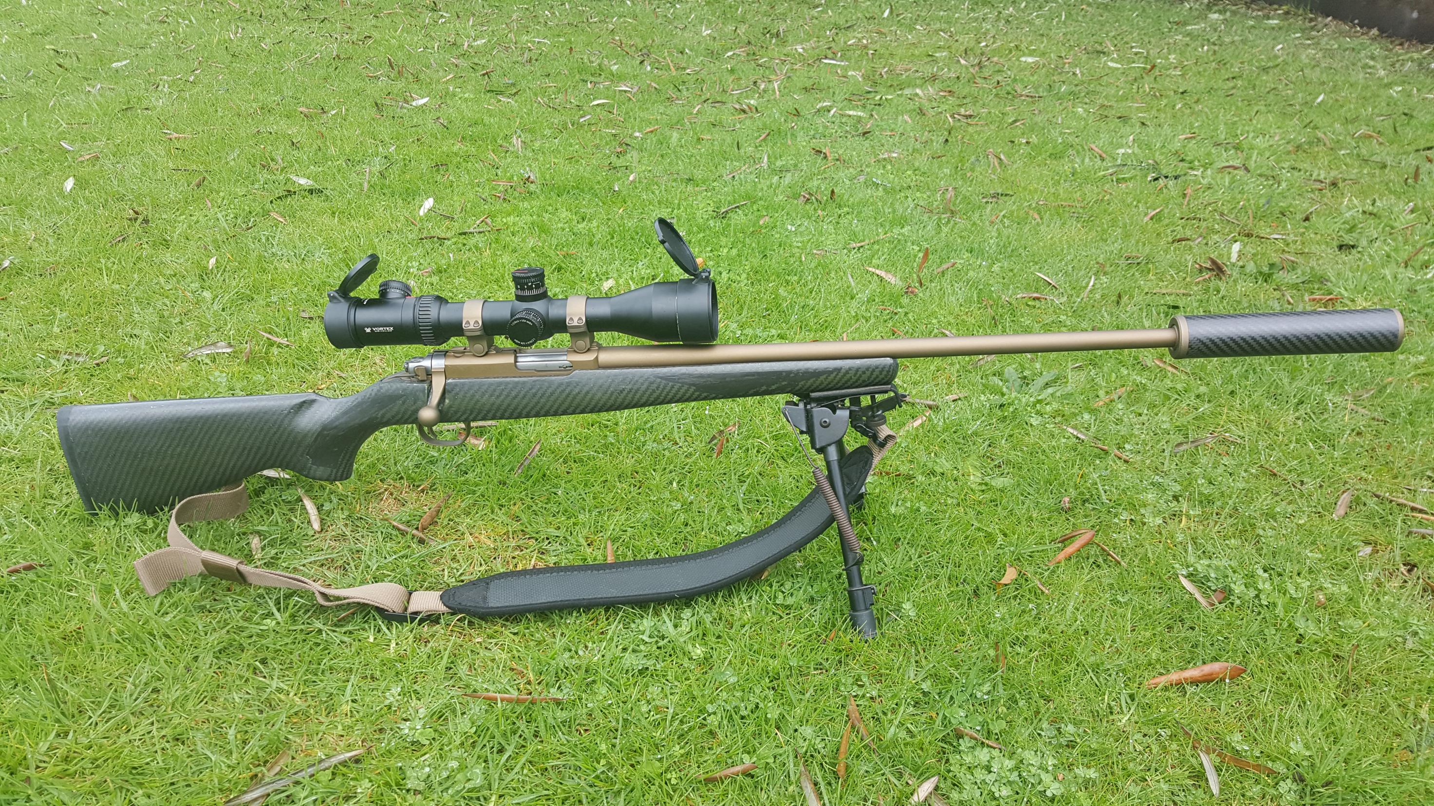 Name:  Ruger 77-22 .22 WMR Cerakoted SS Stug Carbon Stock 2.5-10x44 Vortex Viper PST 1.jpg
Views: 686
Size:  1.23 MB