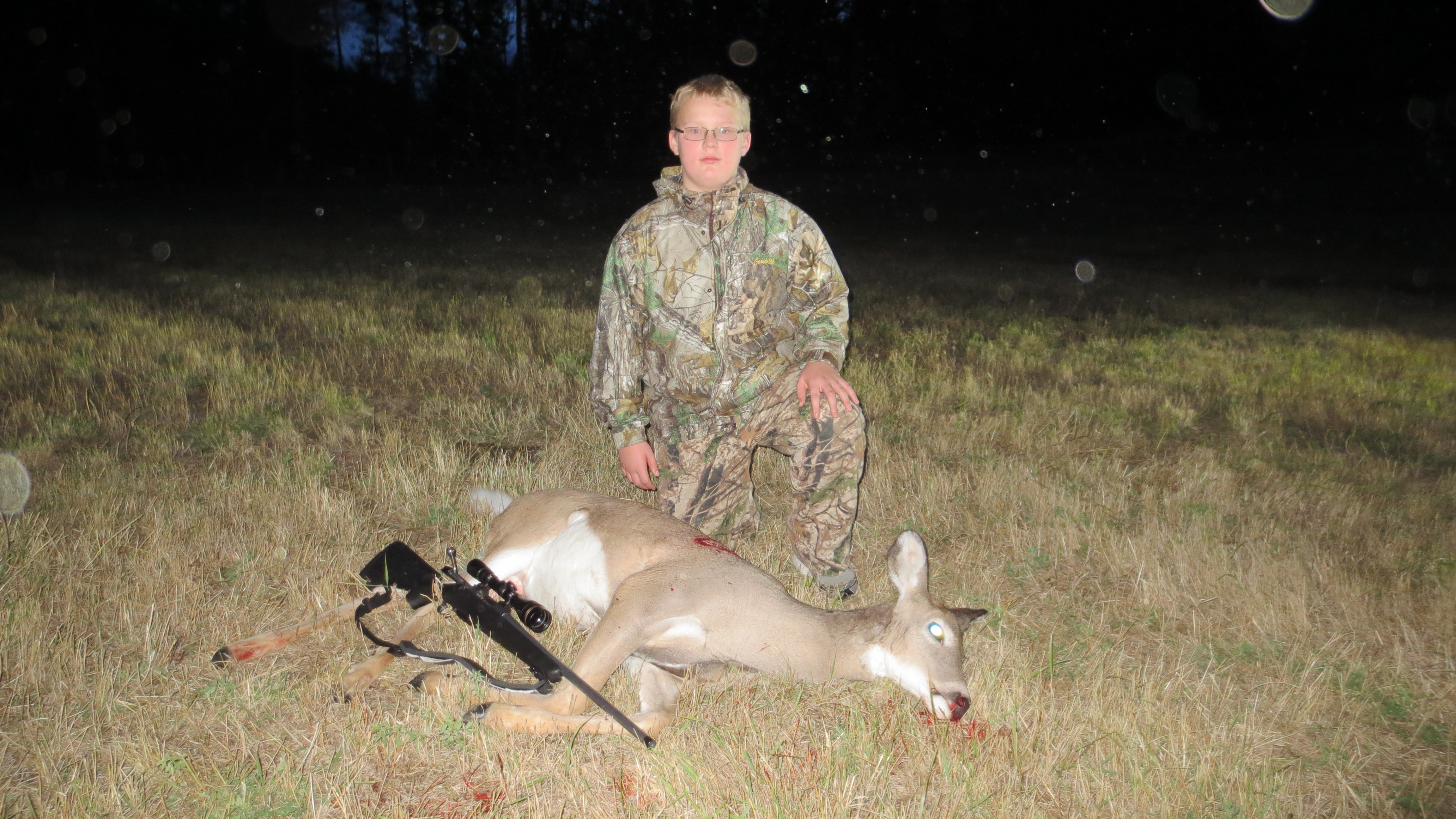 Name:  Tyler's first deer .JPG
Views: 1014
Size:  3.77 MB