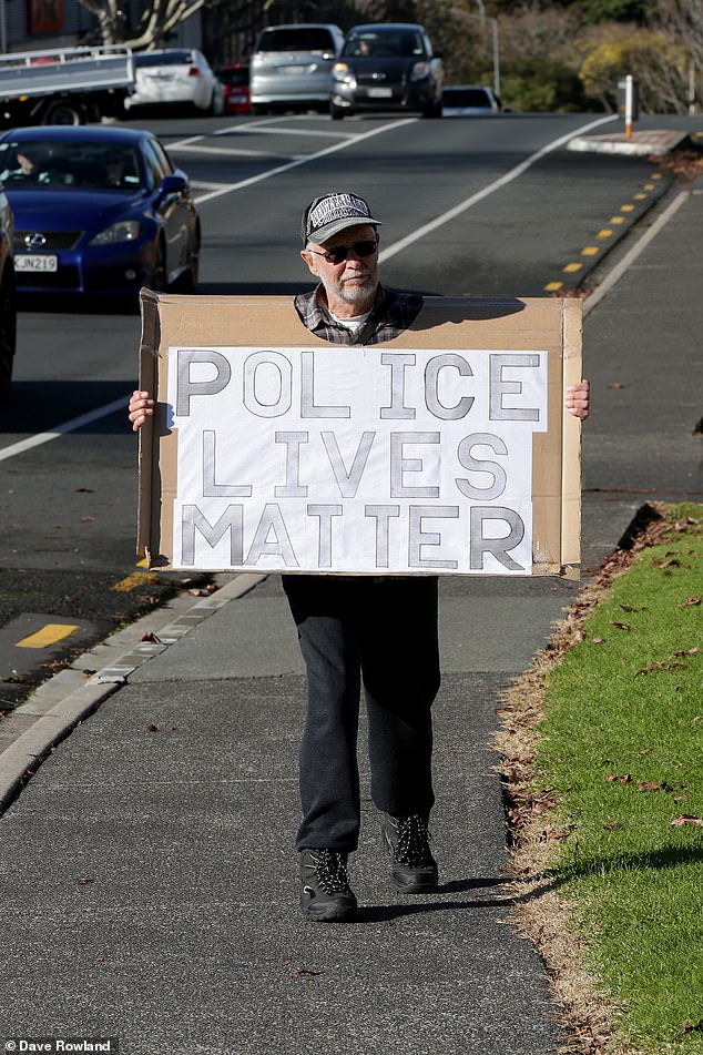 Name:  29840646-8450067-A_member_of_hold_a_police_lives_matter_sign_outside_Henderson_Po-a-15_159290515.jpg
Views: 1112
Size:  168.2 KB