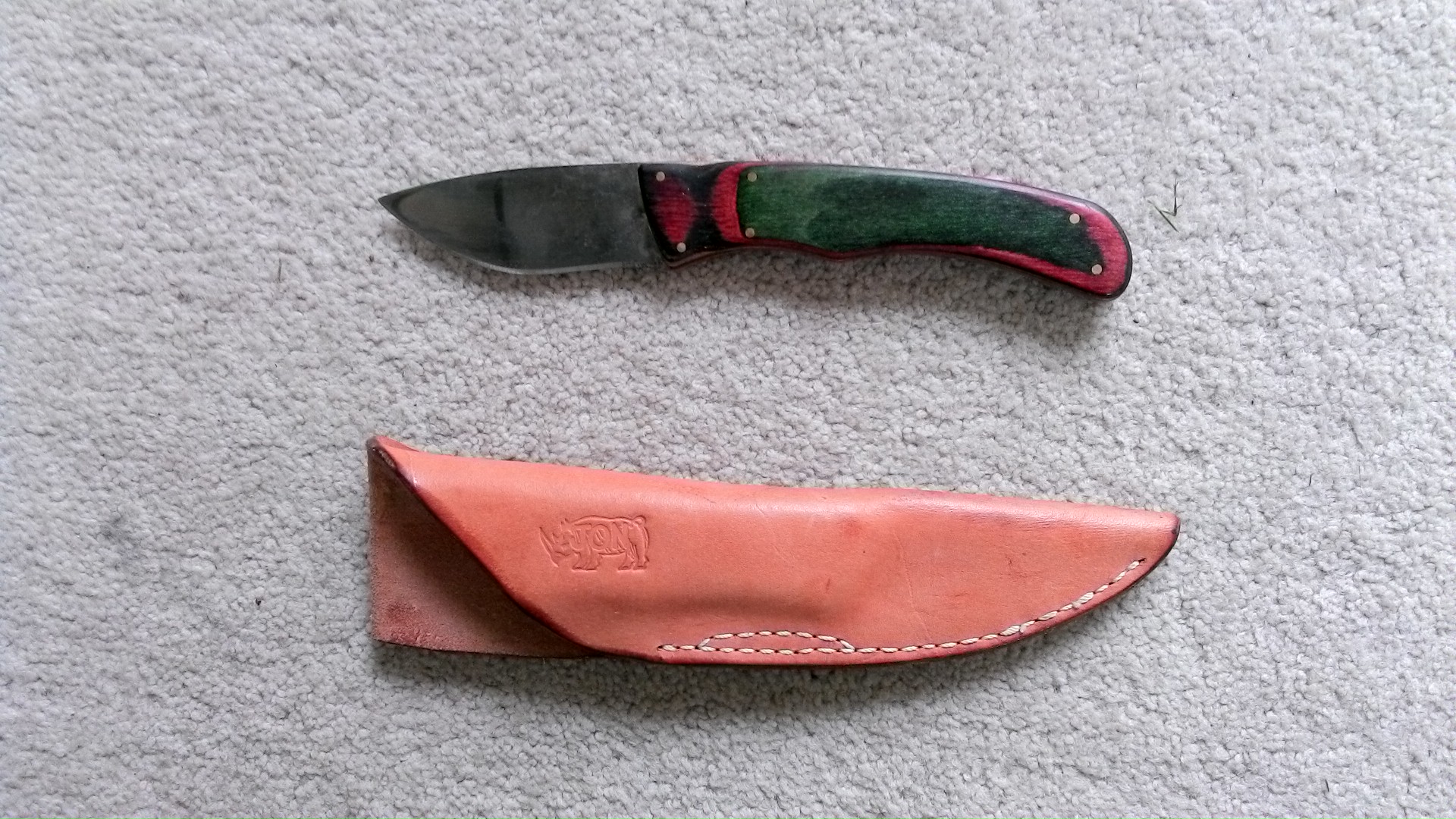 Name:  Jon Russell 3in Skinning  Leather Sheath.JPG
Views: 464
Size:  631.2 KB