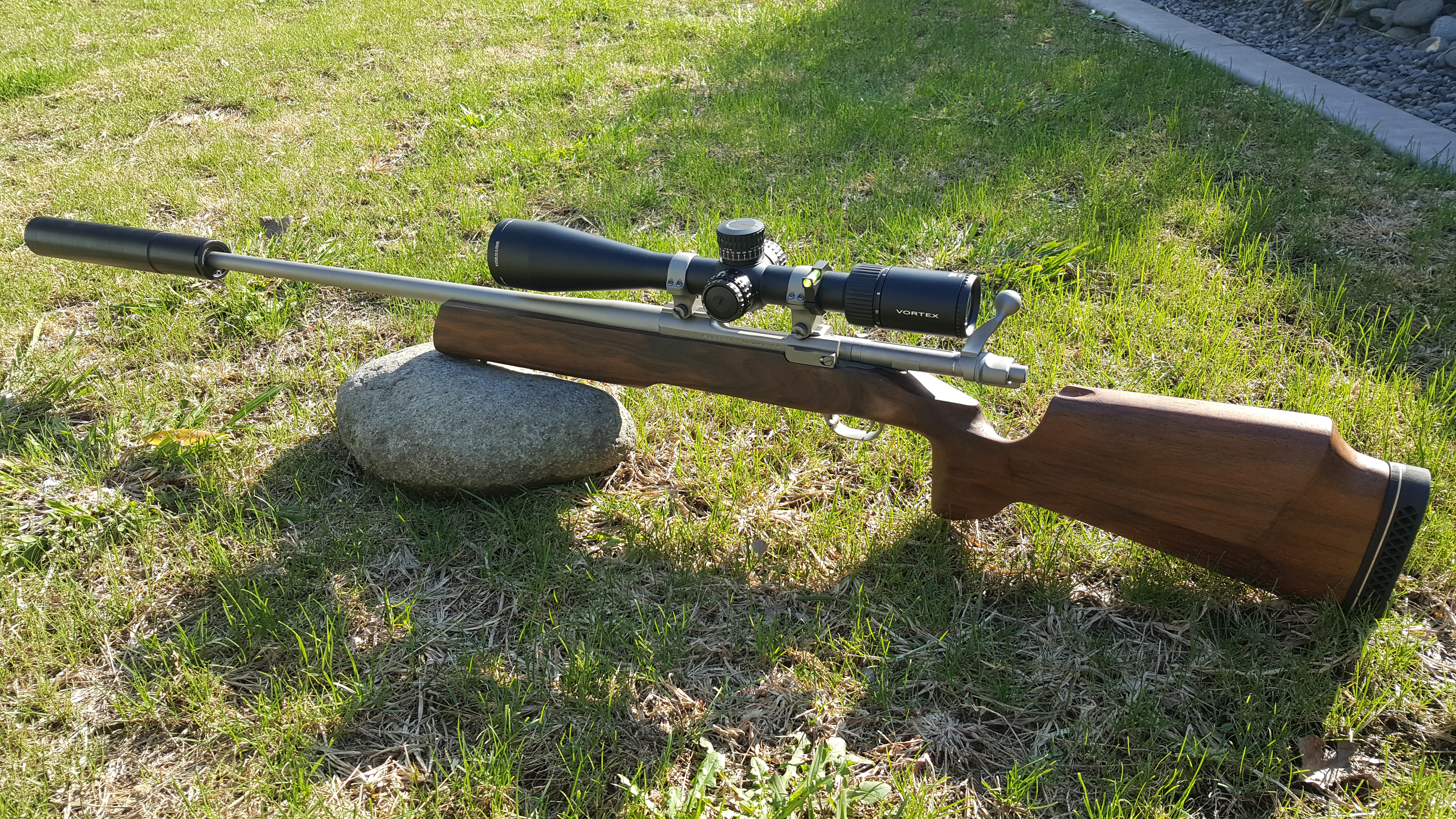 Name:  Ruger M77 Hawkeye .22-243 Hatcher Silouette Walnut Stock Vortex Viper PST Gen II 5-25x50 A-Tec M.jpg
Views: 755
Size:  9.39 MB