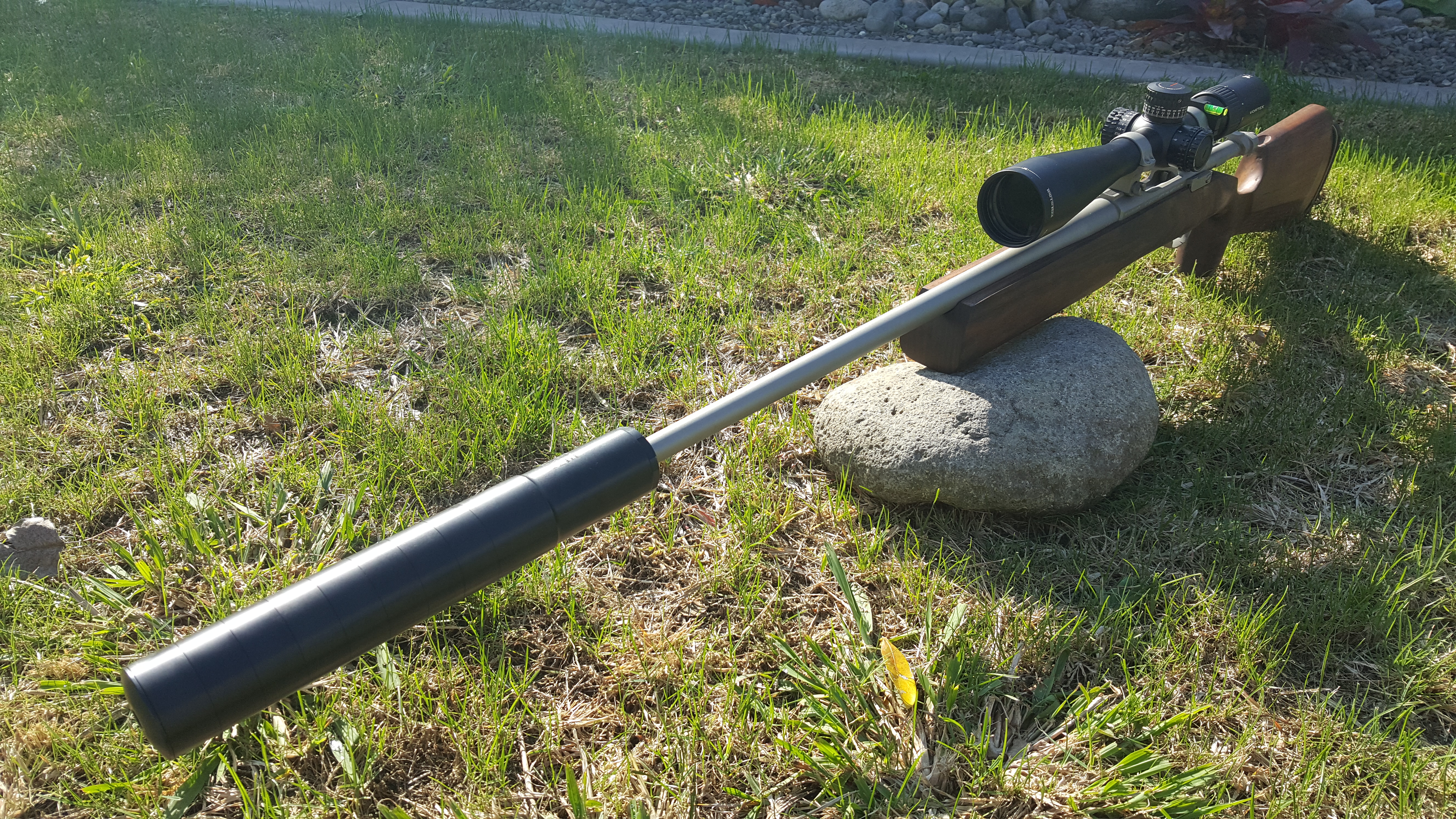 Name:  Ruger M77 Hawkeye .22-243 Hatcher Silouette Walnut Stock Vortex Viper PST Gen II 5-25x50 A-Tec M.jpg
Views: 680
Size:  8.88 MB